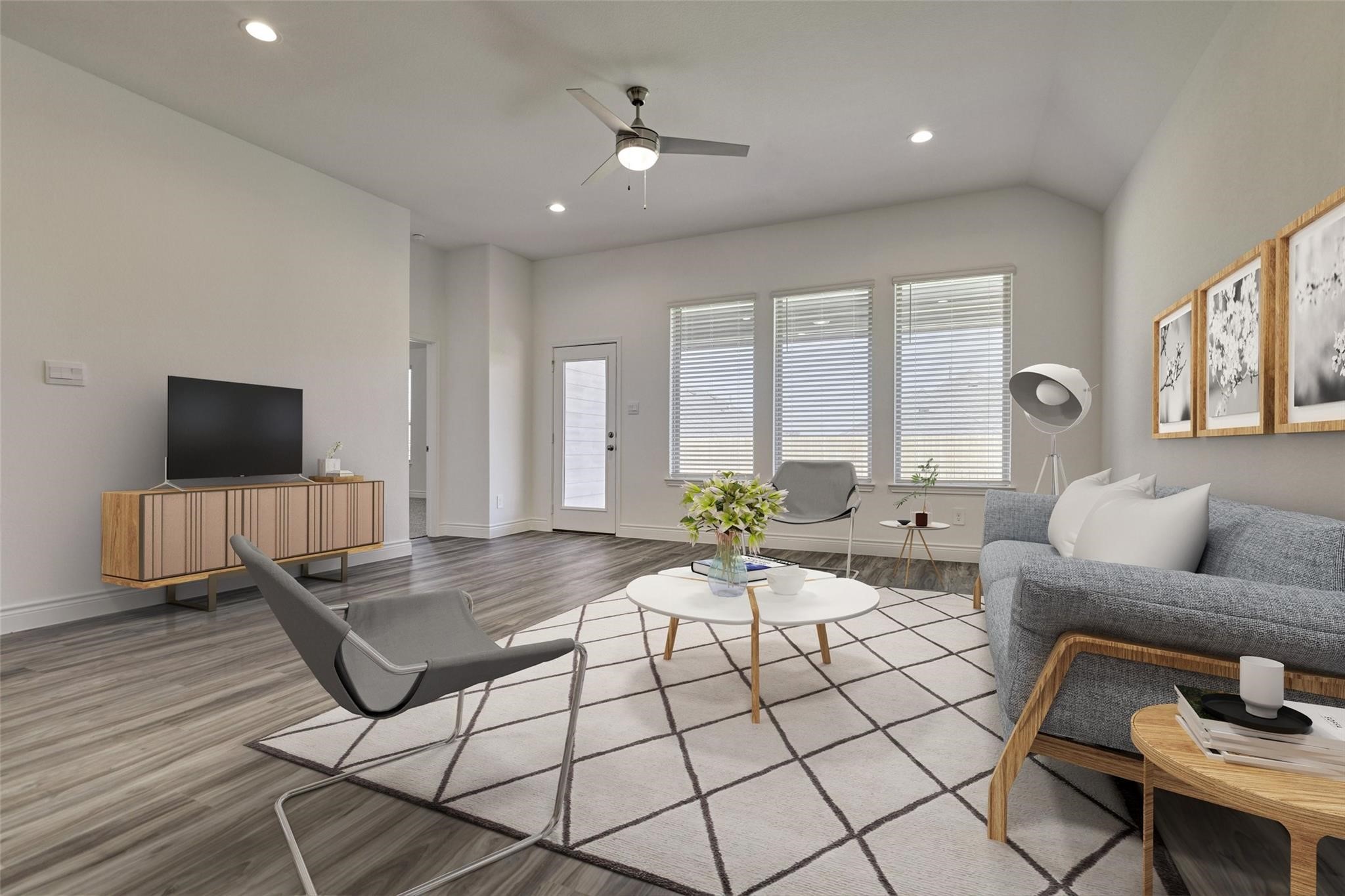 981 Youth Water Road Montgomery, TX 77316 - Photo 24 of 43 a living room with furniture and a flat screen tv