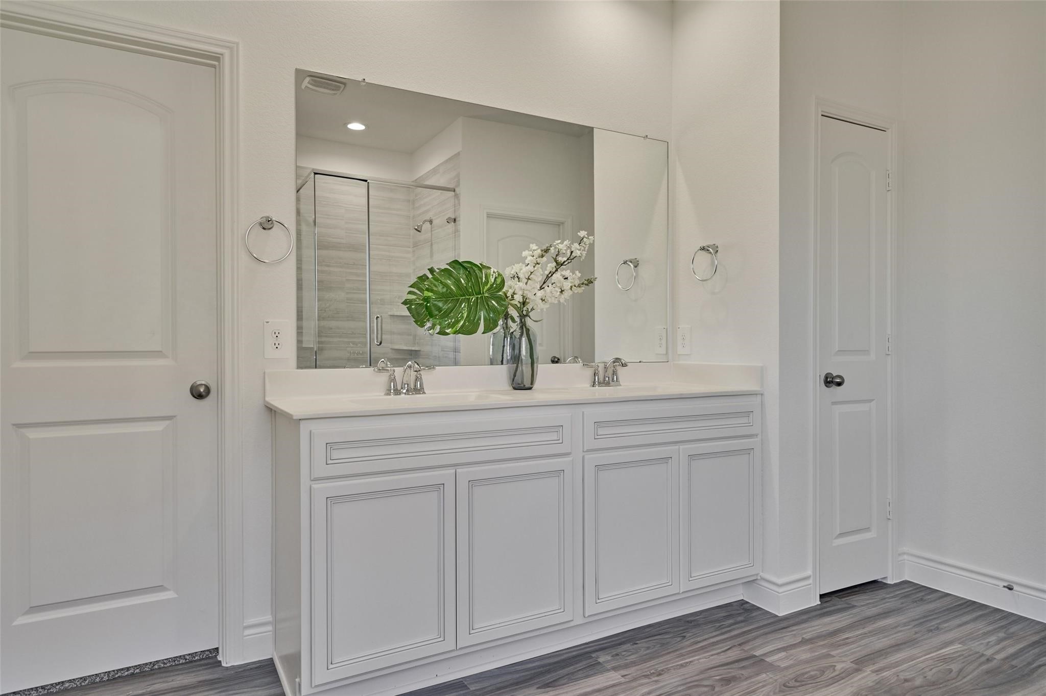 981 Youth Water Road Montgomery, TX 77316 - Photo 30 of 43 a bathroom with a granite countertop sink and a mirror