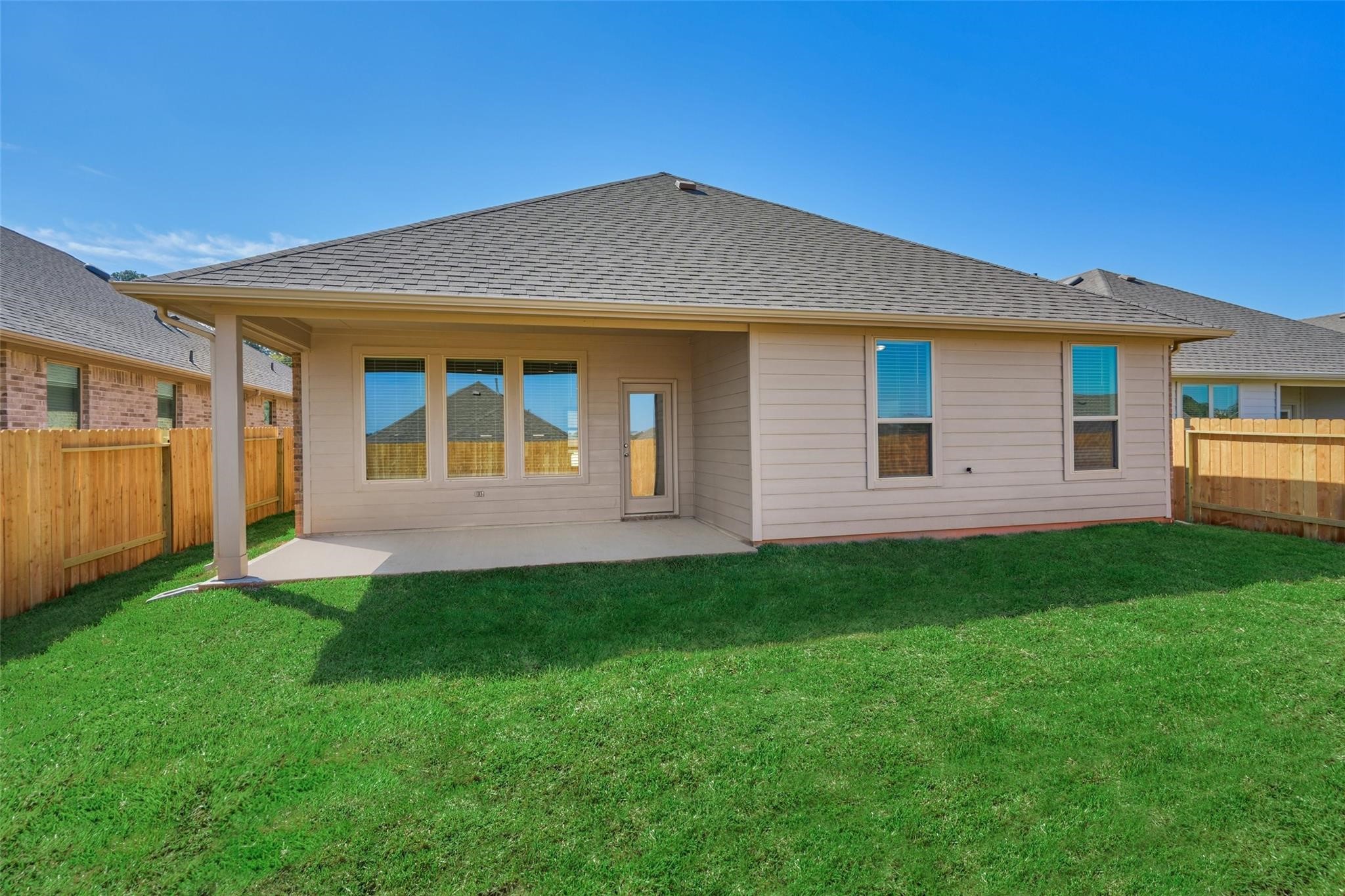 981 Youth Water Road Montgomery, TX 77316 - Photo 36 of 43 a front view of a house with a yard
