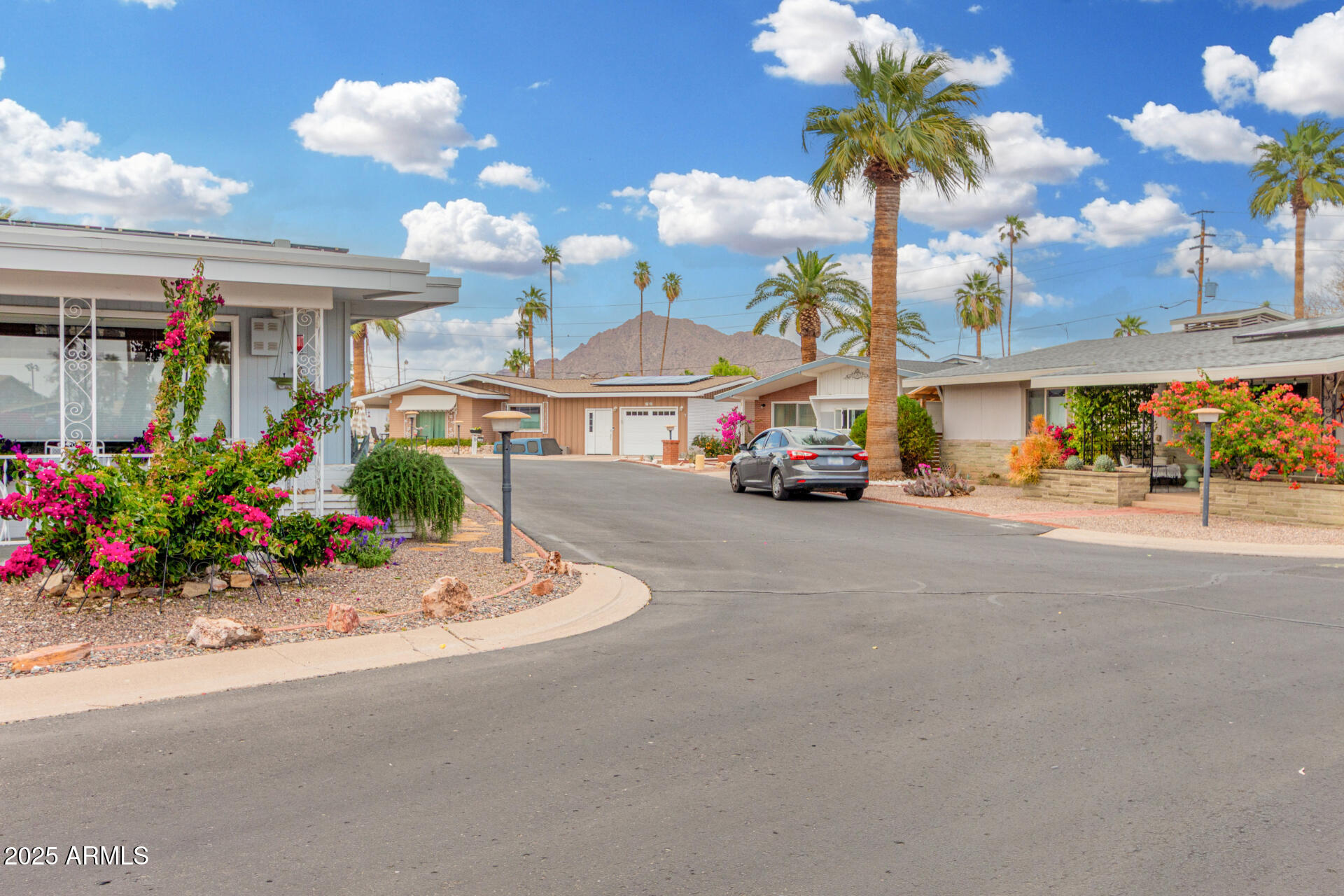 6700 East Thomas Road, Unit 71 Scottsdale, AZ 85251 - Photo 15 of 45 a car parked in front of a building