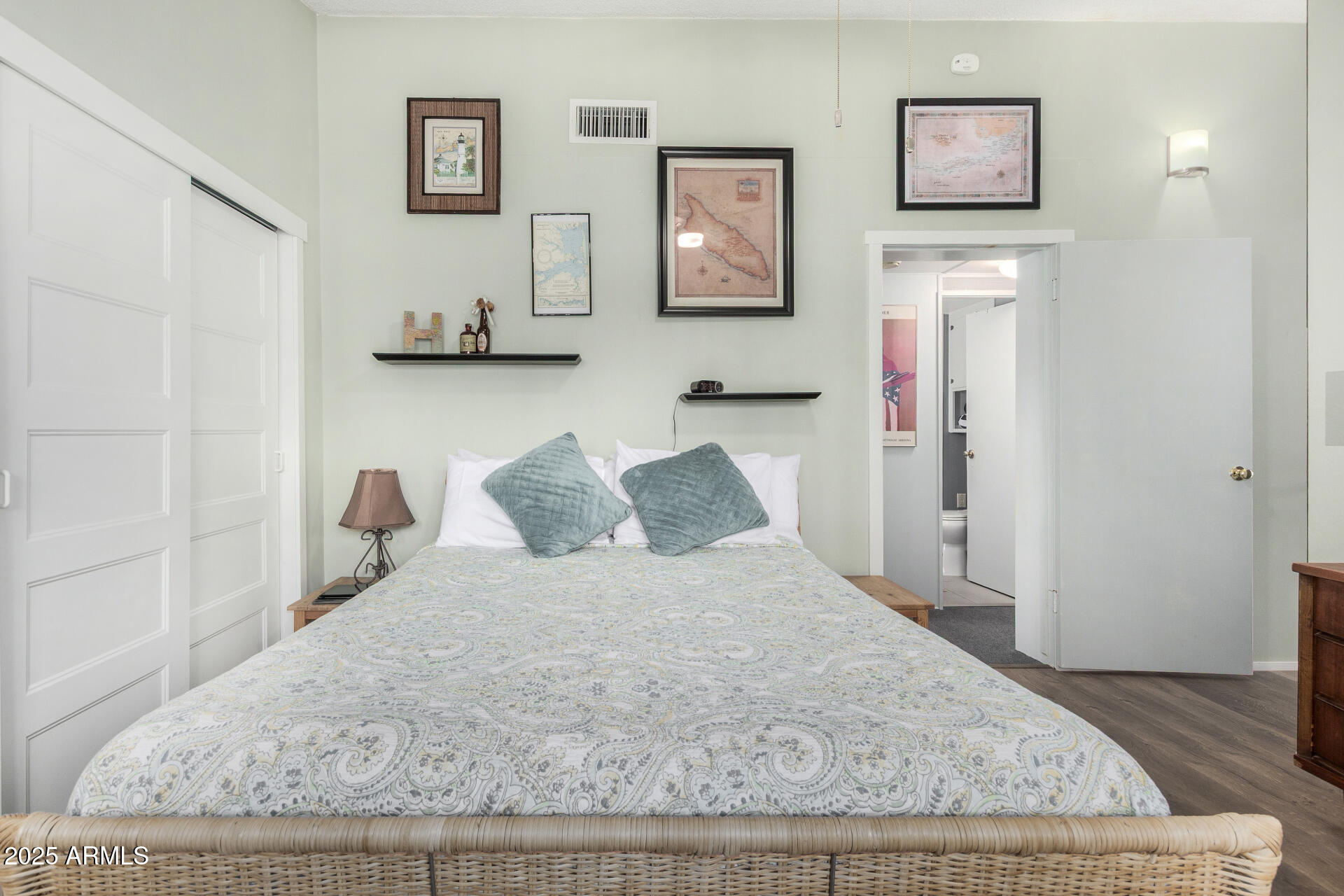 6700 East Thomas Road, Unit 71 Scottsdale, AZ 85251 - Photo 22 of 45 a bedroom with a bed and painting on the wall