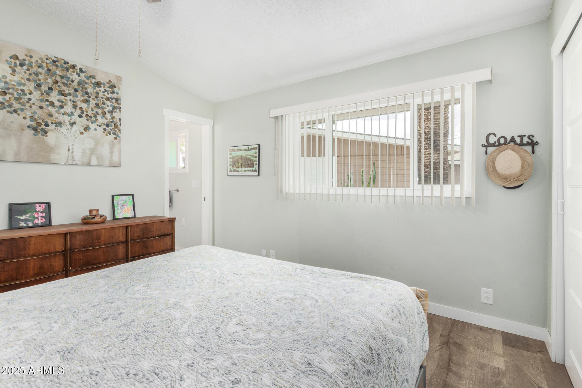 6700 East Thomas Road, Unit 71 Scottsdale, AZ 85251 - Photo 23 of 45 a bedroom with a bed and a window