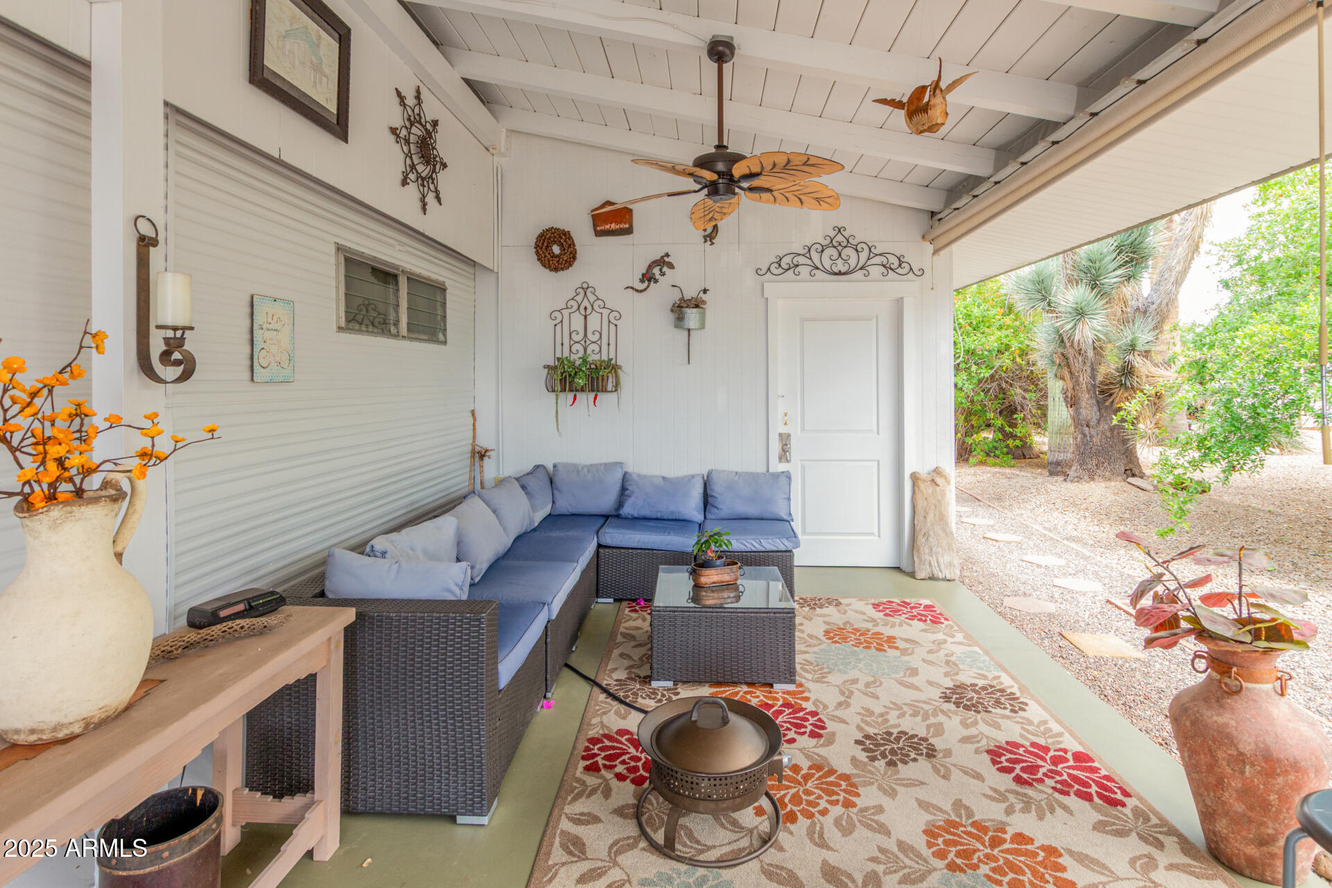 6700 East Thomas Road, Unit 71 Scottsdale, AZ 85251 - Photo 35 of 45 a living room with furniture and a large window