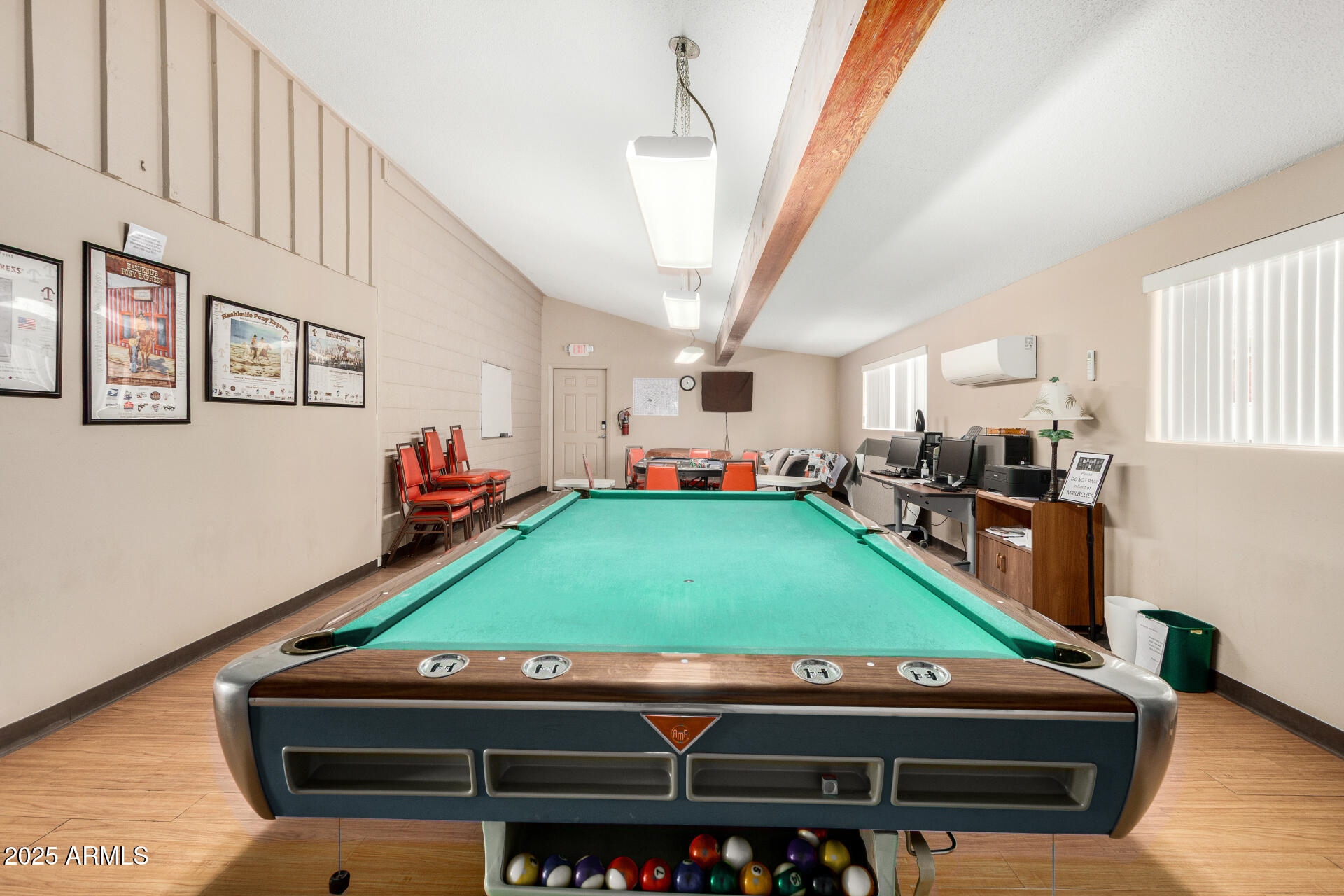 6700 East Thomas Road, Unit 71 Scottsdale, AZ 85251 - Photo 38 of 45 a room with furniture and a flat screen tv