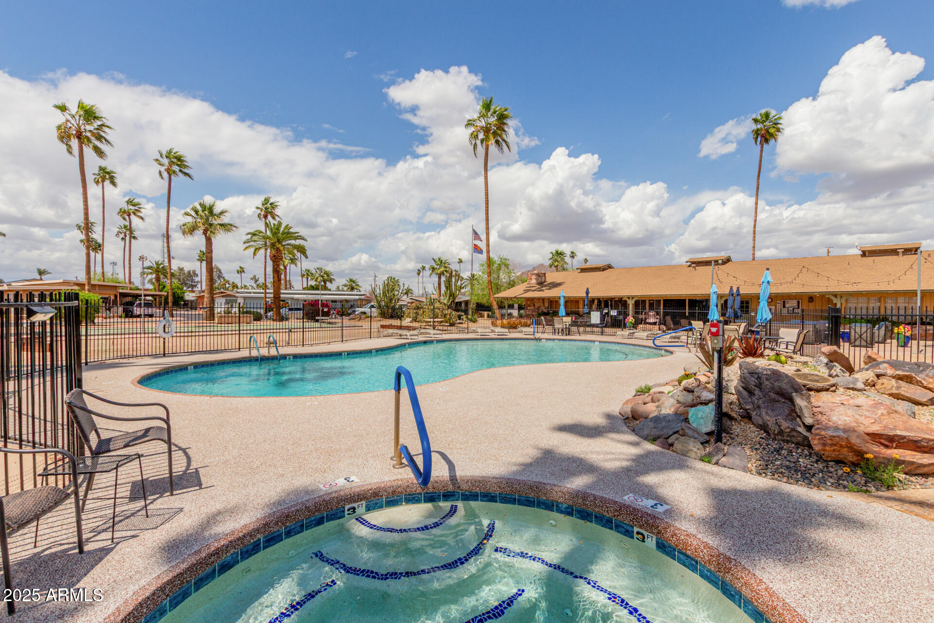 6700 East Thomas Road, Unit 71 Scottsdale, AZ 85251 - Photo 41 of 45 a view of a lake with a sitting area
