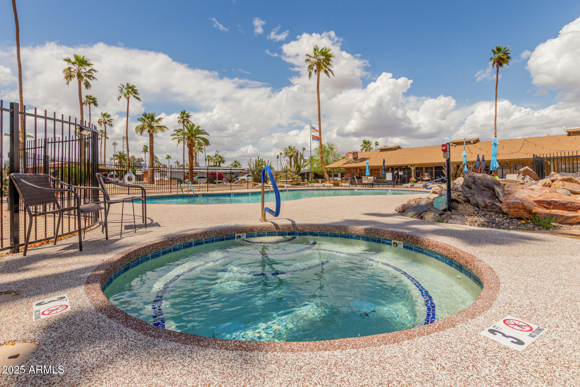 6700 East Thomas Road, Unit 71 Scottsdale, AZ 85251 - Photo 42 of 45 a view of a swimming pool with a terrace