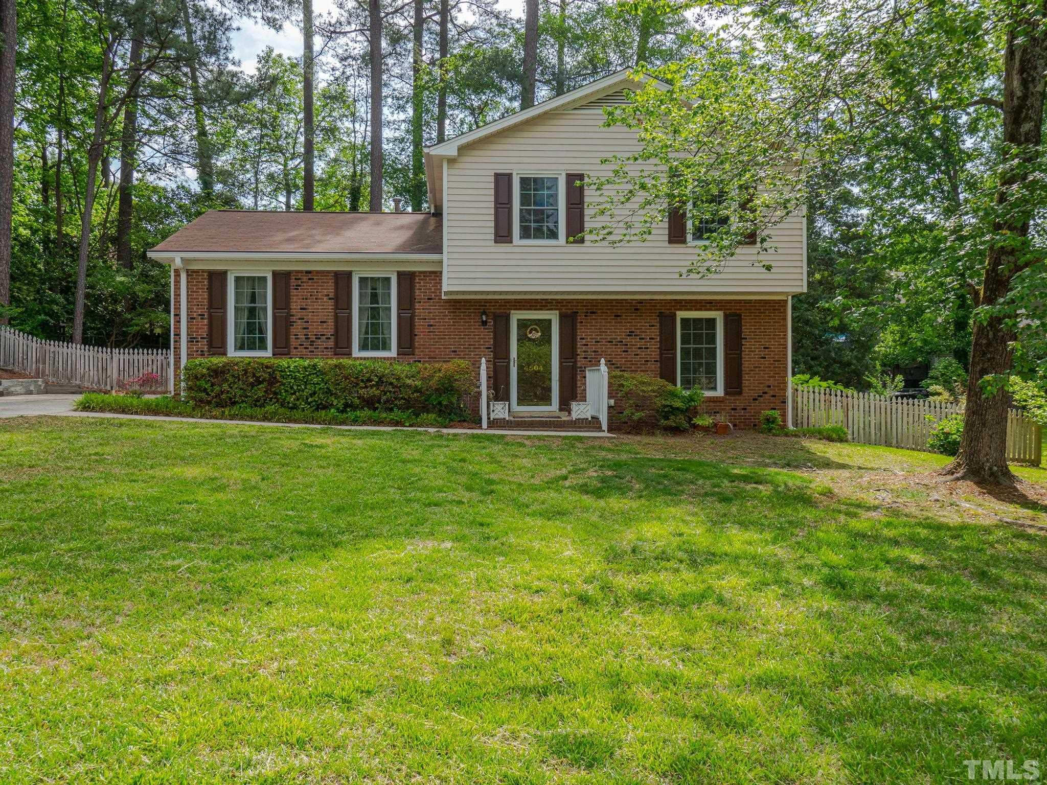 4504 Waterbury Road Raleigh, NC 27604 - Photo 1 of 38 a front view of house with yard and green space