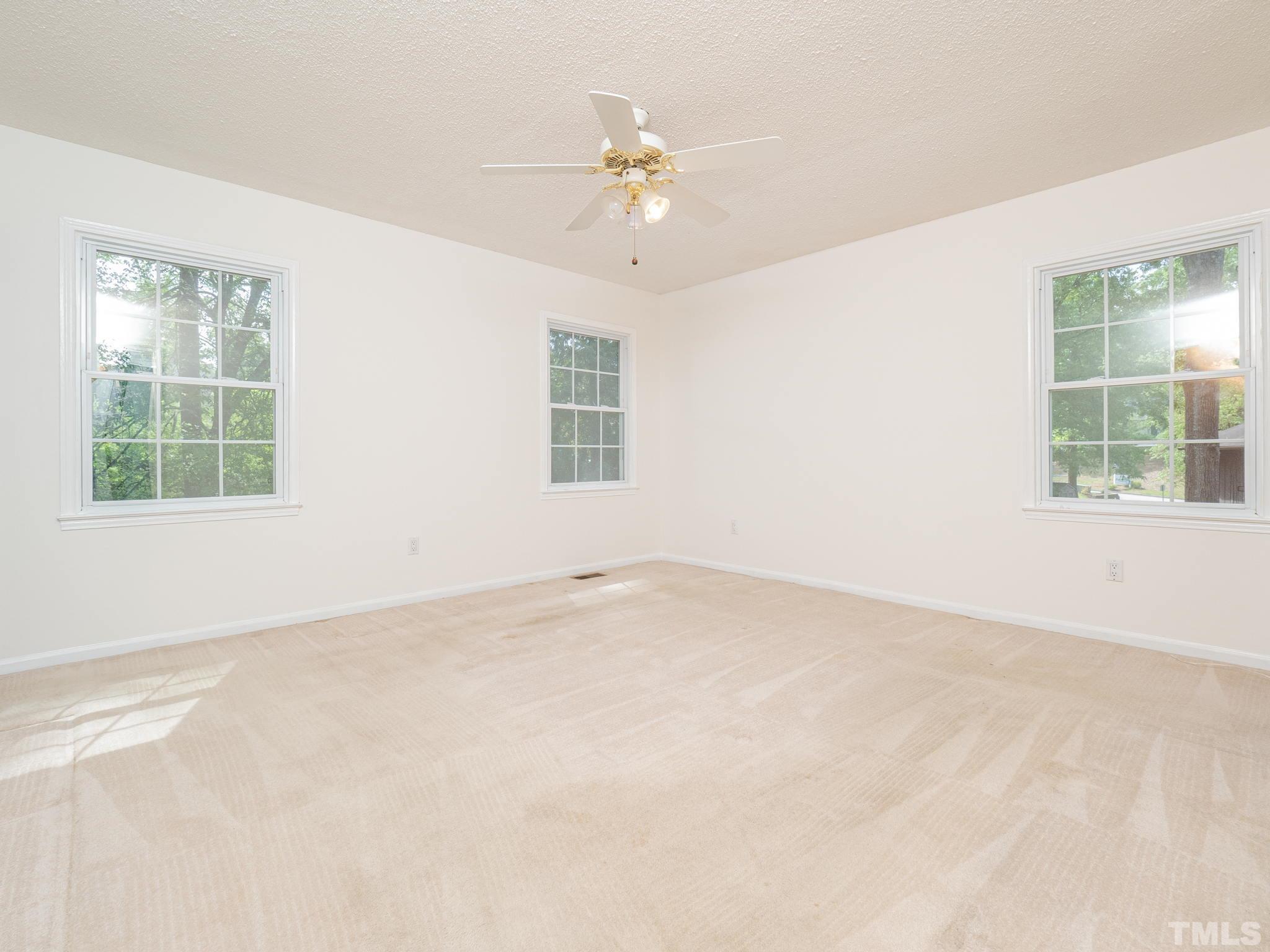 4504 Waterbury Road Raleigh, NC 27604 - Photo 34 of 38 an empty room with a window