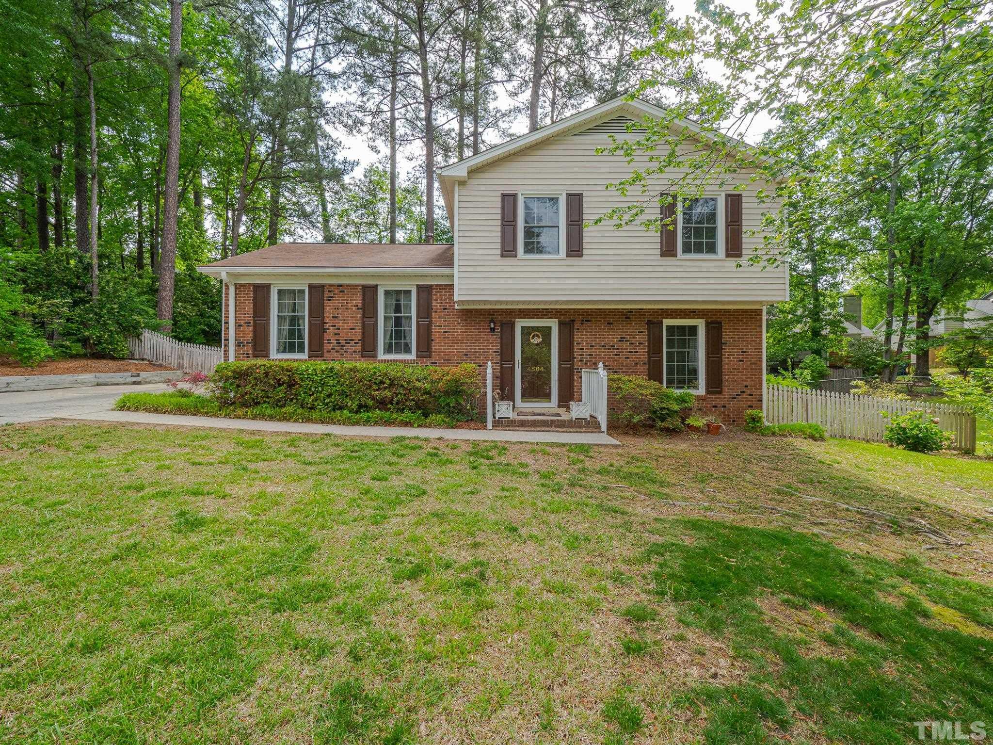 4504 Waterbury Road Raleigh, NC 27604 - Photo 4 of 38 front view of a house with a yard