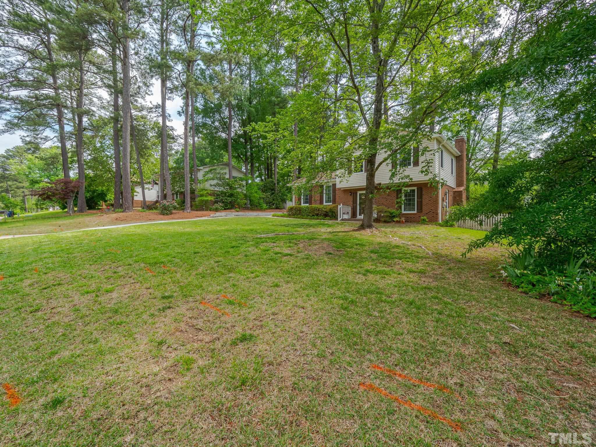 4504 Waterbury Road Raleigh, NC 27604 - Photo 8 of 38 a view of a house with a big yard