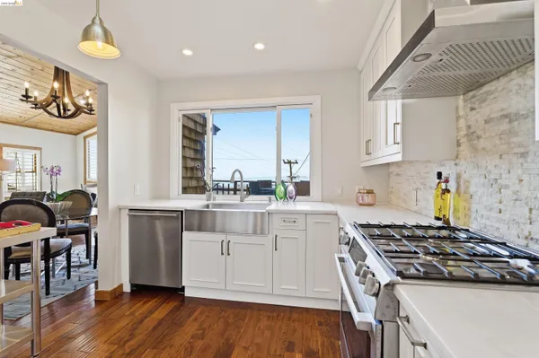 a view of a kitchen and dining room