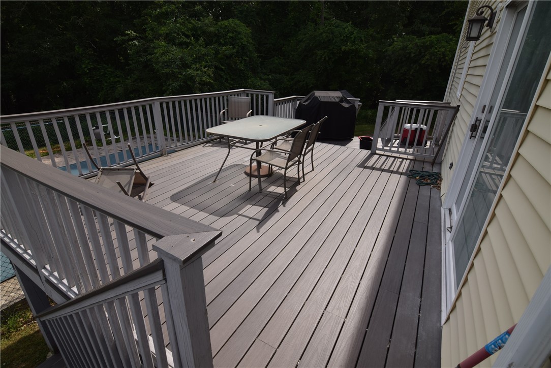 8 Pequot Avenue Westerly, RI 02891 - Photo 28 of 33 large two tiered deck overlooking private rear yard and inground pool and shed