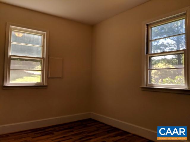 243 Resettlement Road Madison, VA 22727 - Photo 11 of 18 a view of a small space with wooden floor and a window
