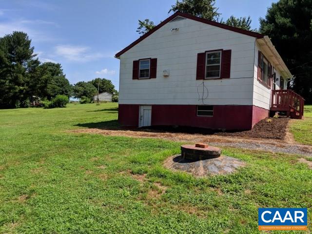 243 Resettlement Road Madison, VA 22727 - Photo 15 of 18 a front view of a house with a yard