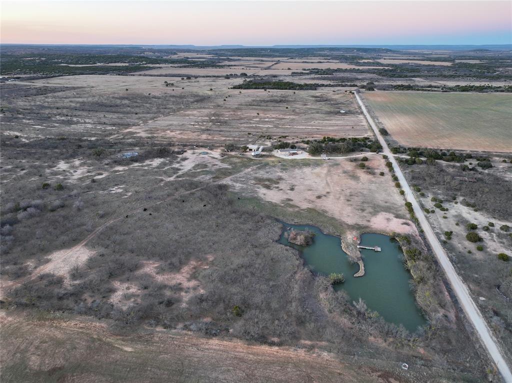 322 County Road 494 Novice, TX 79538 - Photo 1 of 35 a view of a lake with a beach