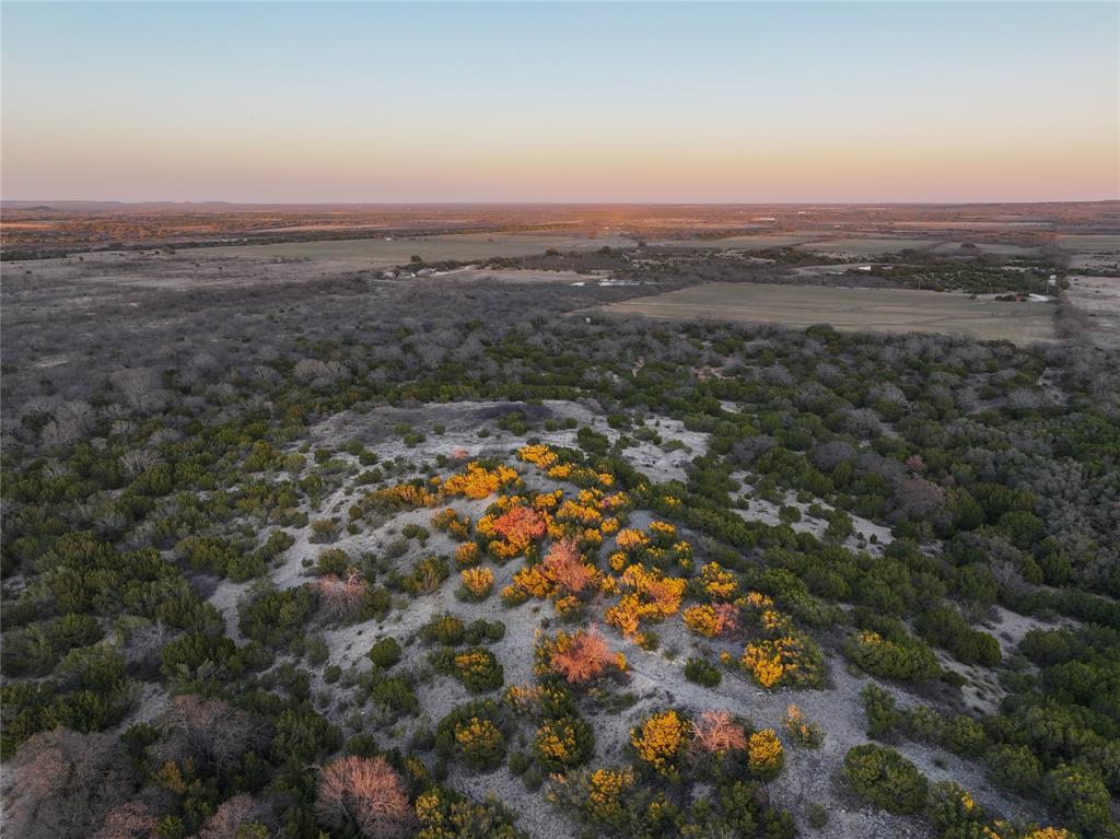 322 County Road 494 Novice, TX 79538 - Photo 14 of 35 an aerial view of house with yard and mountain view in back