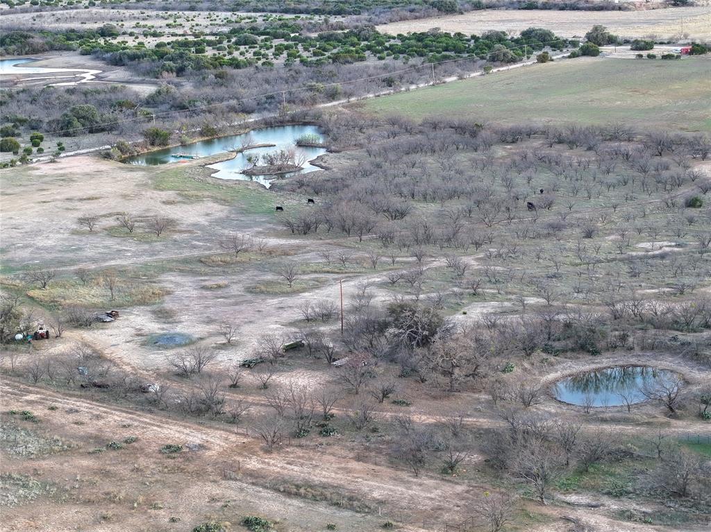 322 County Road 494 Novice, TX 79538 - Photo 15 of 35 a view of a dry yard with wooden fence
