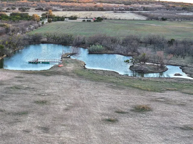 an aerial view of mountain with beach