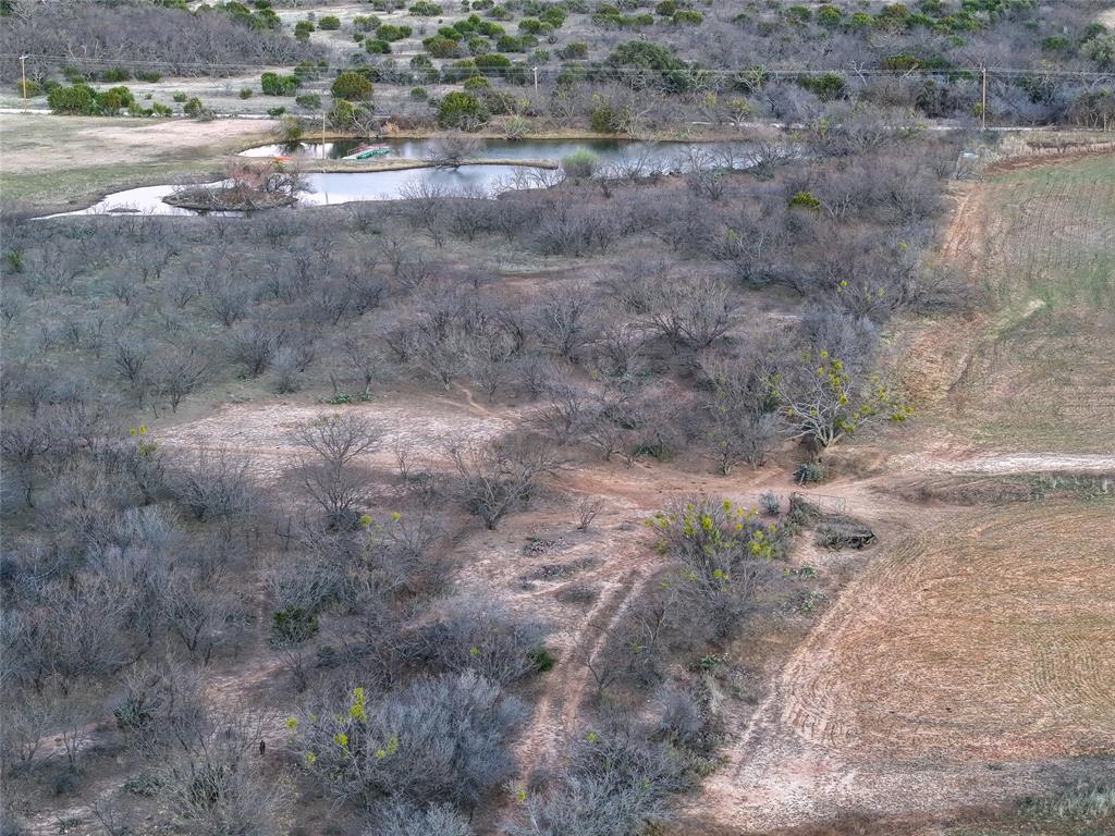322 County Road 494 Novice, TX 79538 - Photo 19 of 35 a view of a dry yard with wooden fence