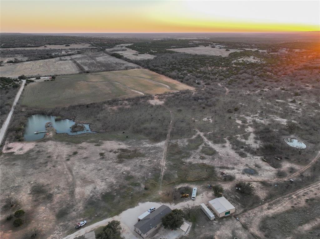 322 County Road 494 Novice, TX 79538 - Photo 3 of 35 an aerial view of residential houses with outdoor space