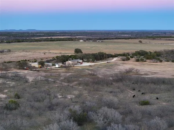 an aerial view of beach and city