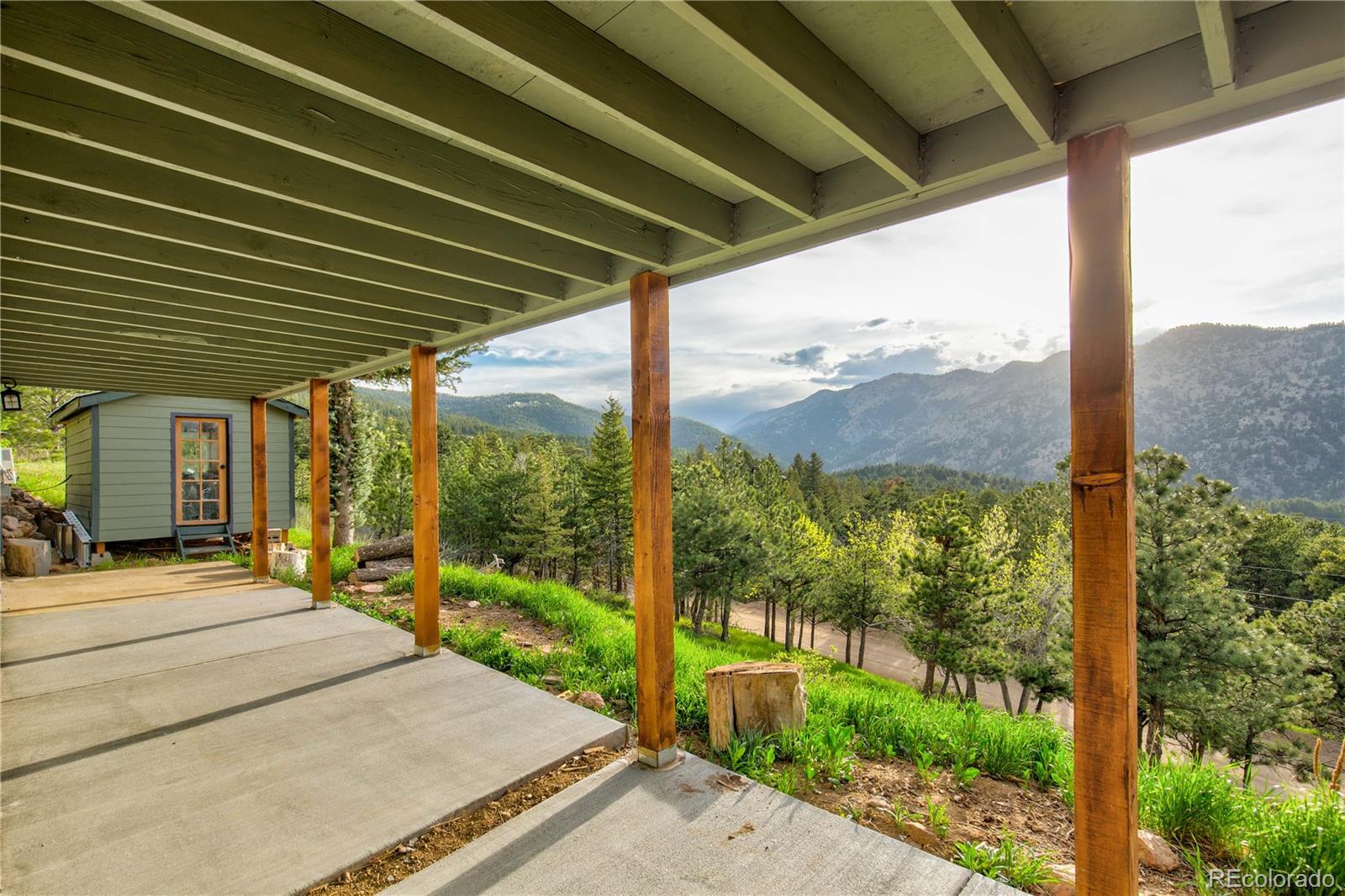 136 Elk Ridge Lane Boulder, CO 80302 - Photo 26 of 27 a porch with view of outdoor space
