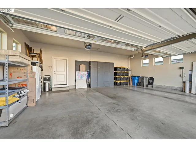 a view of a hallway with stairs