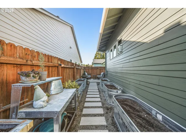 a view of a balcony with wooden floor
