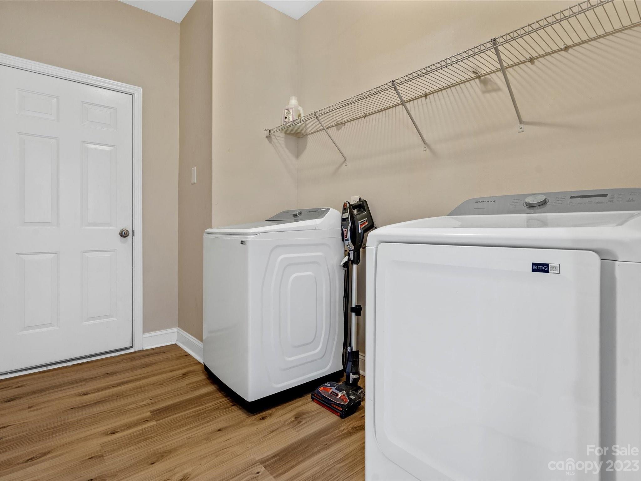 9300 Seamill Road Charlotte, NC 28278 - Photo 14 of 28 a utility room with dryer and washer
