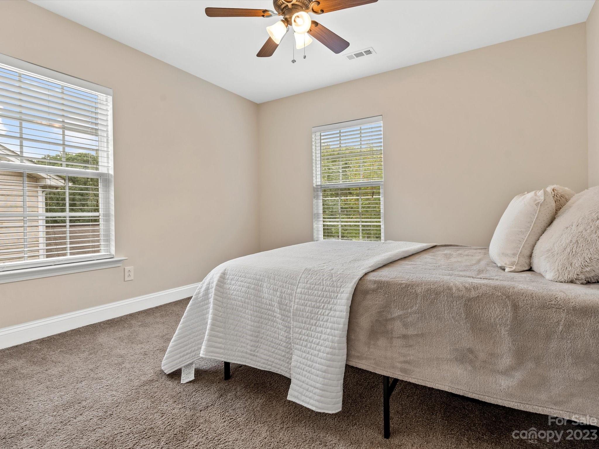 9300 Seamill Road Charlotte, NC 28278 - Photo 23 of 28 a bedroom with a bed and window