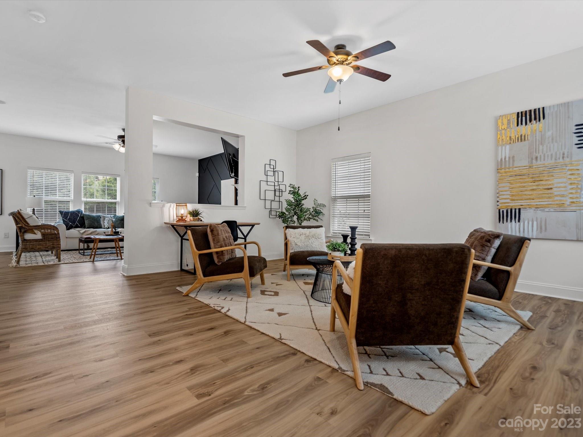 9300 Seamill Road Charlotte, NC 28278 - Photo 3 of 28 a living room with furniture and wooden floor