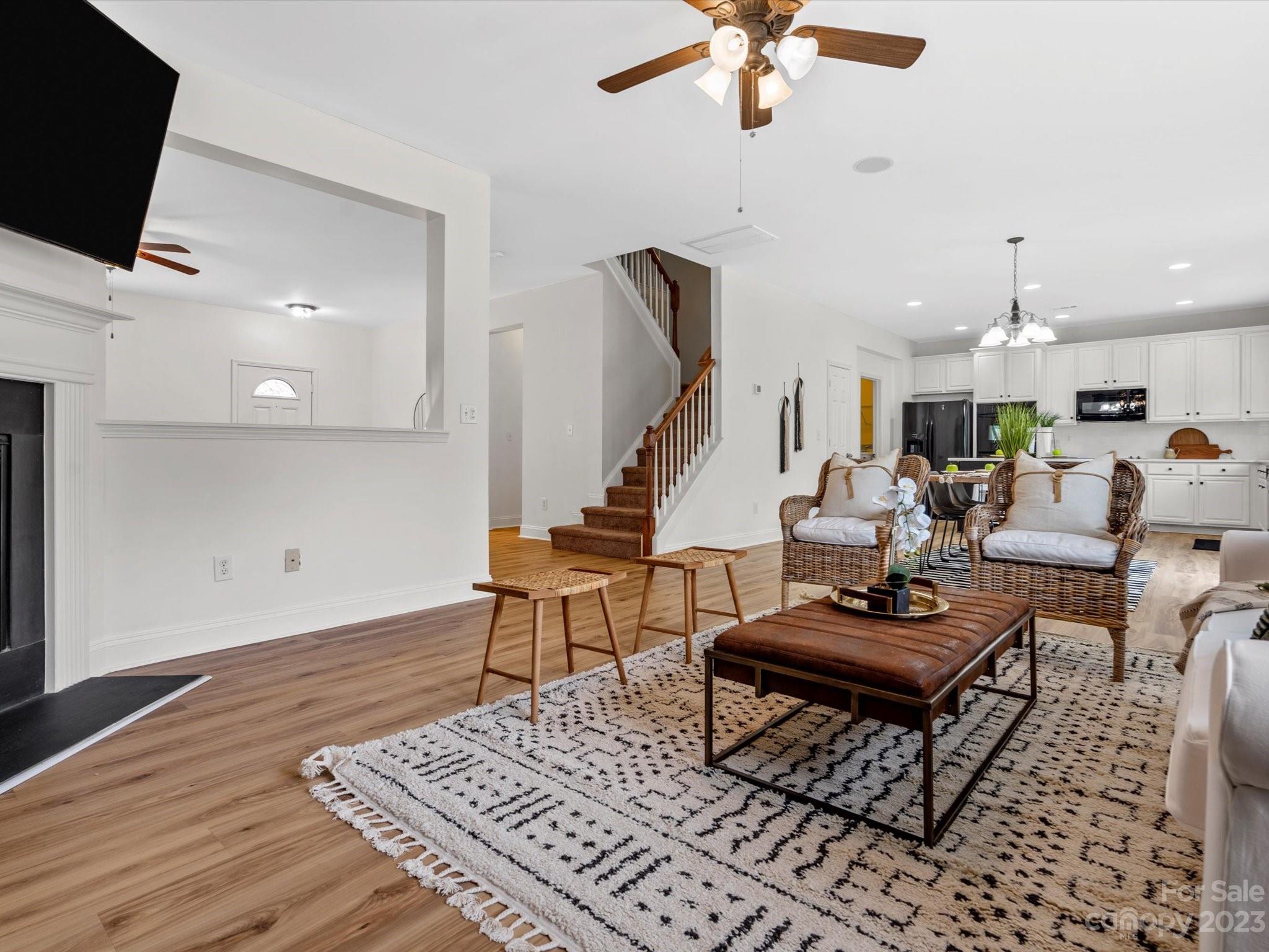 9300 Seamill Road Charlotte, NC 28278 - Photo 8 of 28 a living room with furniture and wooden floor