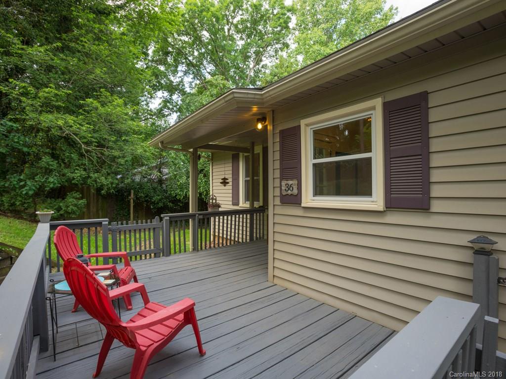 36 Sayles Road Asheville, NC 28803 - Photo 2 of 26 a view of a patio with wooden floor and outdoor seating