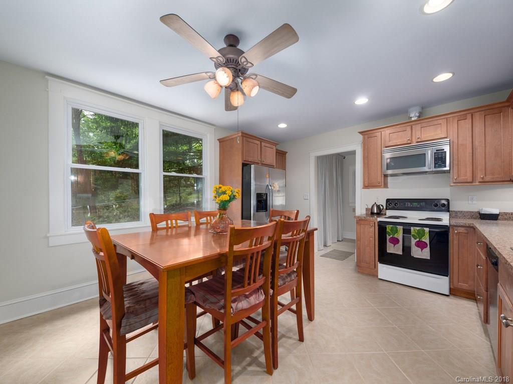 36 Sayles Road Asheville, NC 28803 - Photo 13 of 26 a view of a dining room with furniture window and outside view