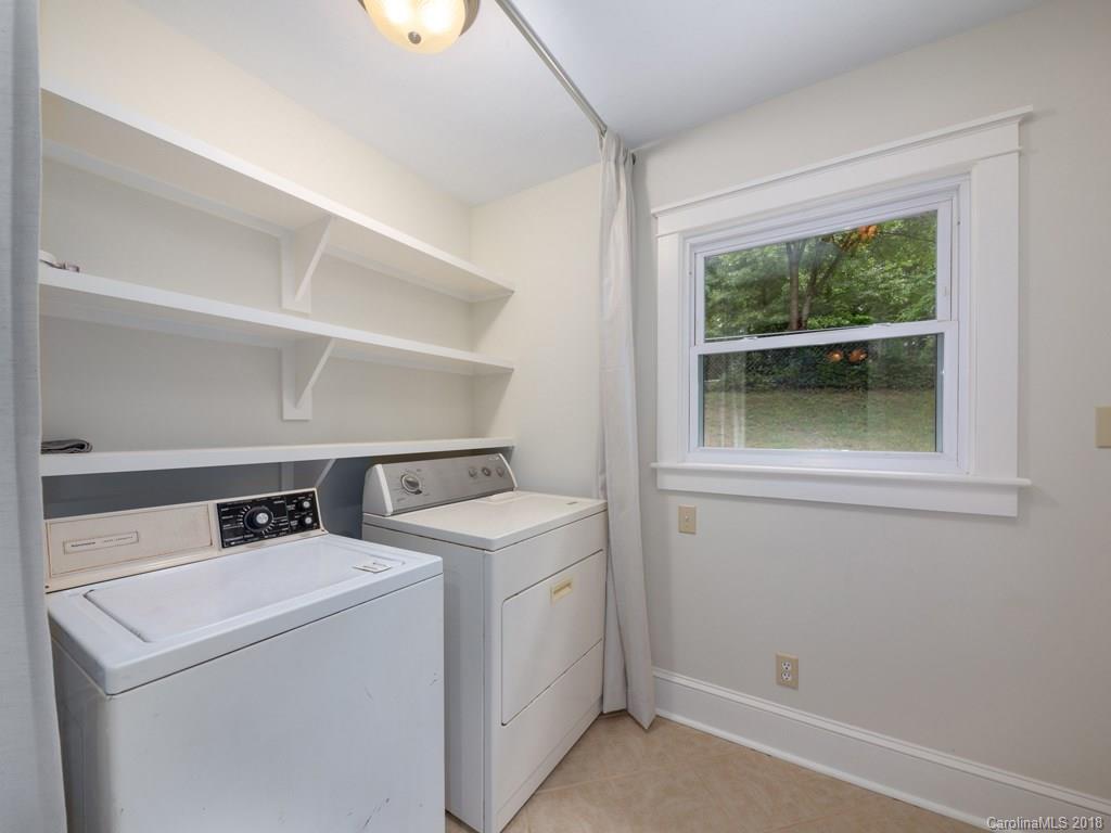 36 Sayles Road Asheville, NC 28803 - Photo 17 of 26 a utility room with dryer and washer