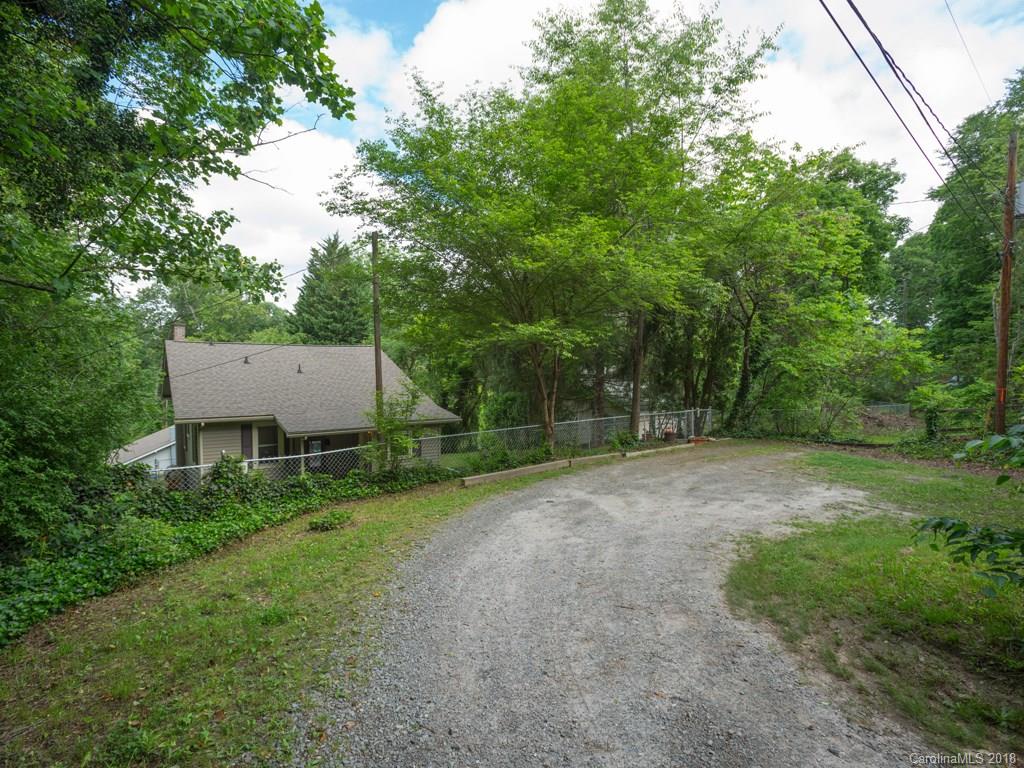 36 Sayles Road Asheville, NC 28803 - Photo 21 of 26 a view of a house with a yard and tree