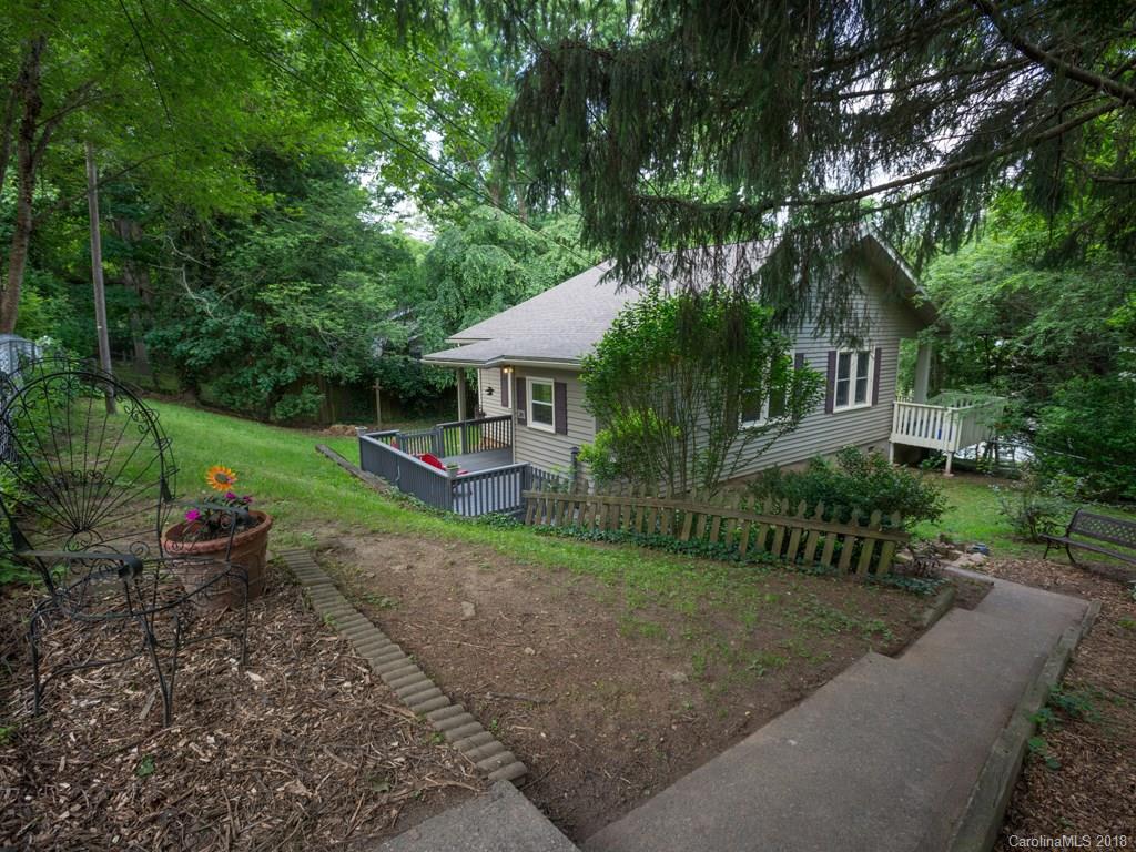36 Sayles Road Asheville, NC 28803 - Photo 23 of 26 a front view of a house with garden