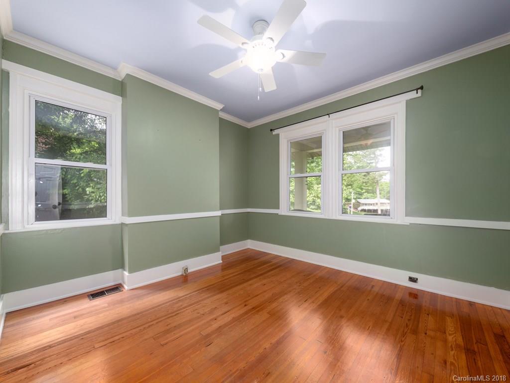 36 Sayles Road Asheville, NC 28803 - Photo 8 of 26 a view of empty room with window and ceiling fan