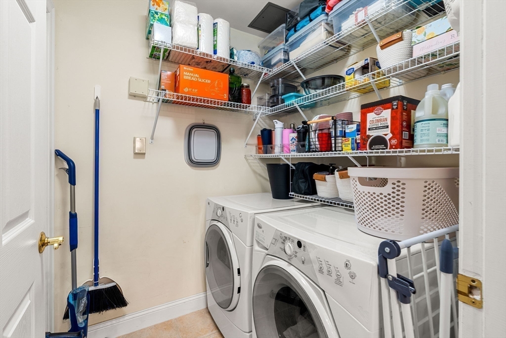 19 Broad Street, Unit 203 Merrimac, MA 01860 - Photo 18 of 22 a utility room with dryer and washer