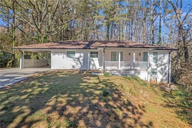front view of a house with a yard