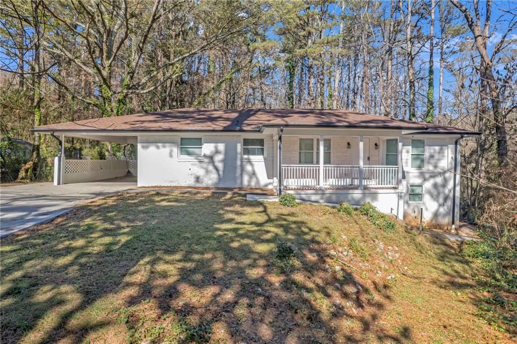 front view of a house with a yard