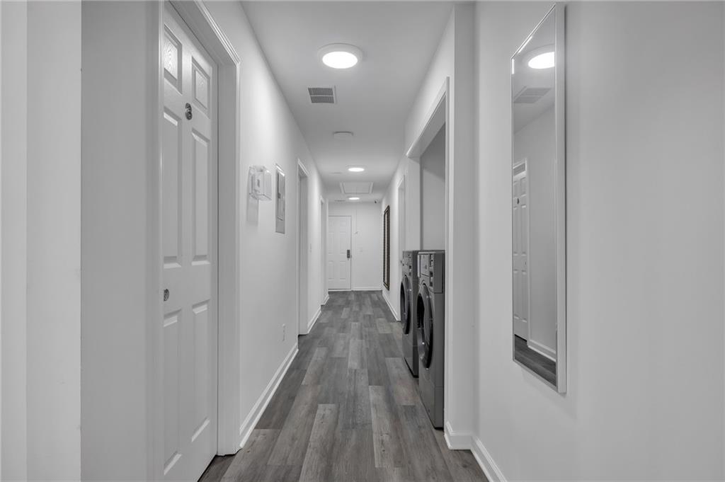 344 East Rhinehill Road Southeast Atlanta, GA 30315 - Photo 11 of 29 a view of a hallway with wooden floor