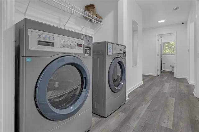 a view of entryway with washer and dryer