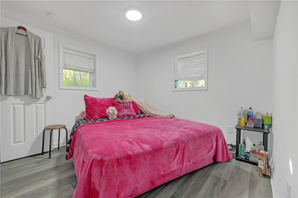 344 East Rhinehill Road Southeast Atlanta, GA 30315 - Photo 19 of 29 a bedroom with a bed and a window