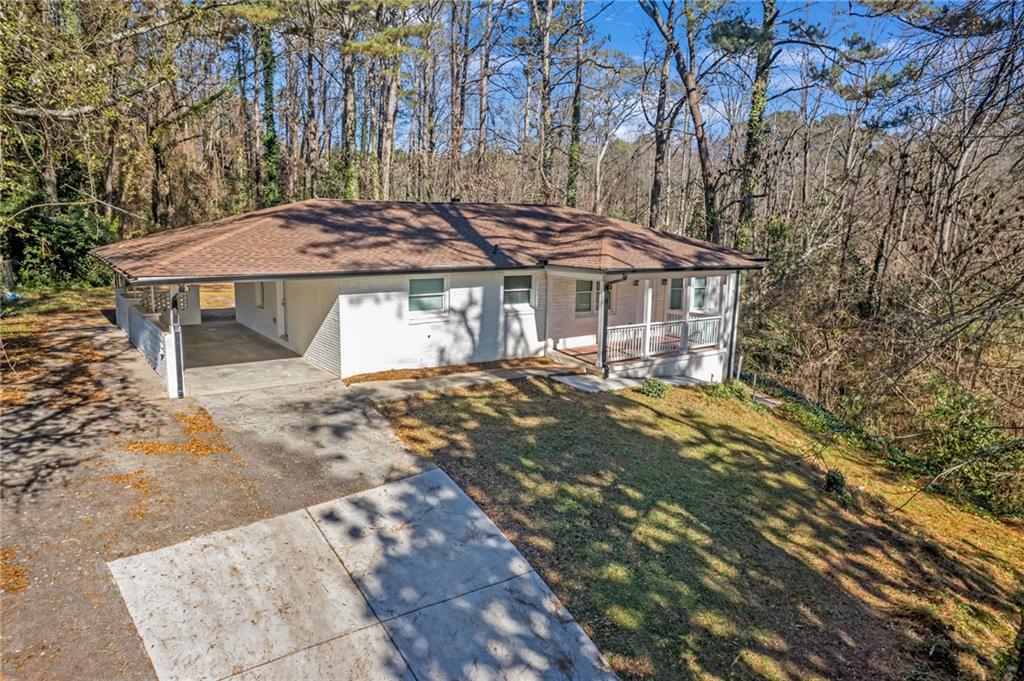 344 East Rhinehill Road Southeast Atlanta, GA 30315 - Photo 2 of 29 front view of a house with a yard