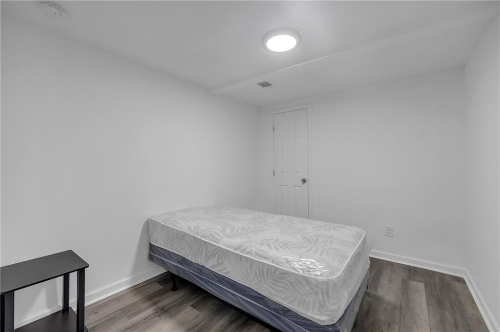 344 East Rhinehill Road Southeast Atlanta, GA 30315 - Photo 24 of 29 a room with a bed