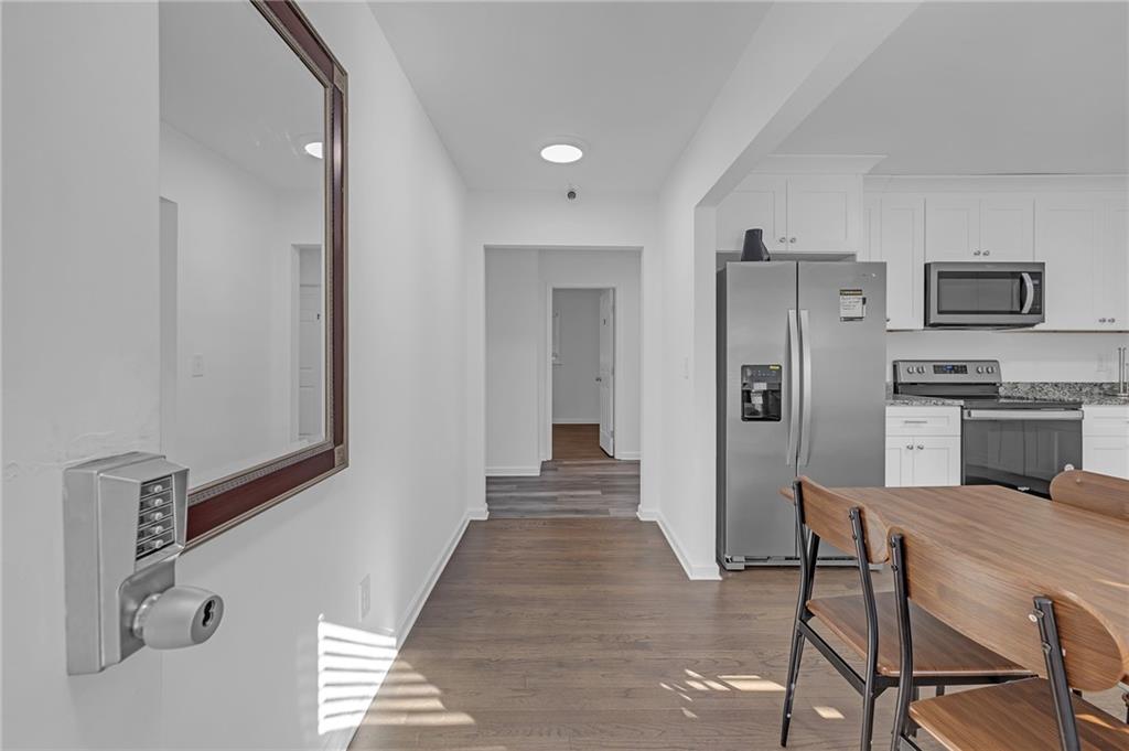 344 East Rhinehill Road Southeast Atlanta, GA 30315 - Photo 5 of 29 a view of a hallway with seating area
