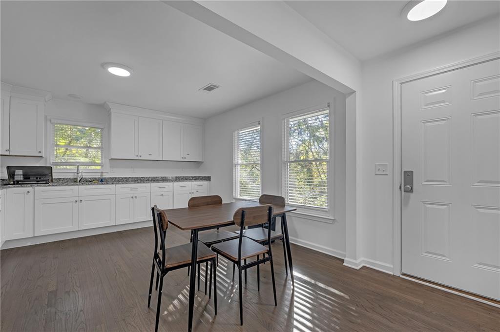 344 East Rhinehill Road Southeast Atlanta, GA 30315 - Photo 8 of 29 a view of a dining room with furniture and window