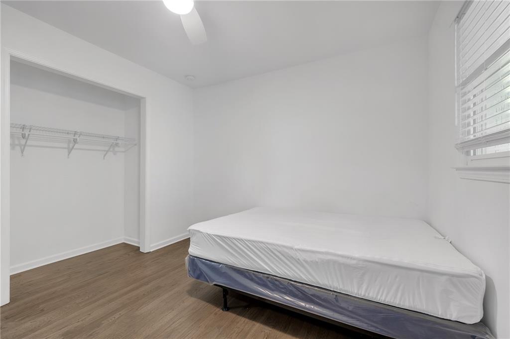 344 East Rhinehill Road Southeast Atlanta, GA 30315 - Photo 10 of 29 a bedroom with a bed and a window