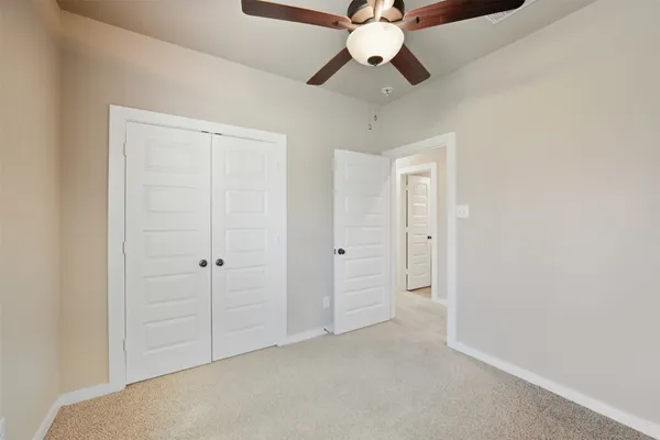 en empty room with fan